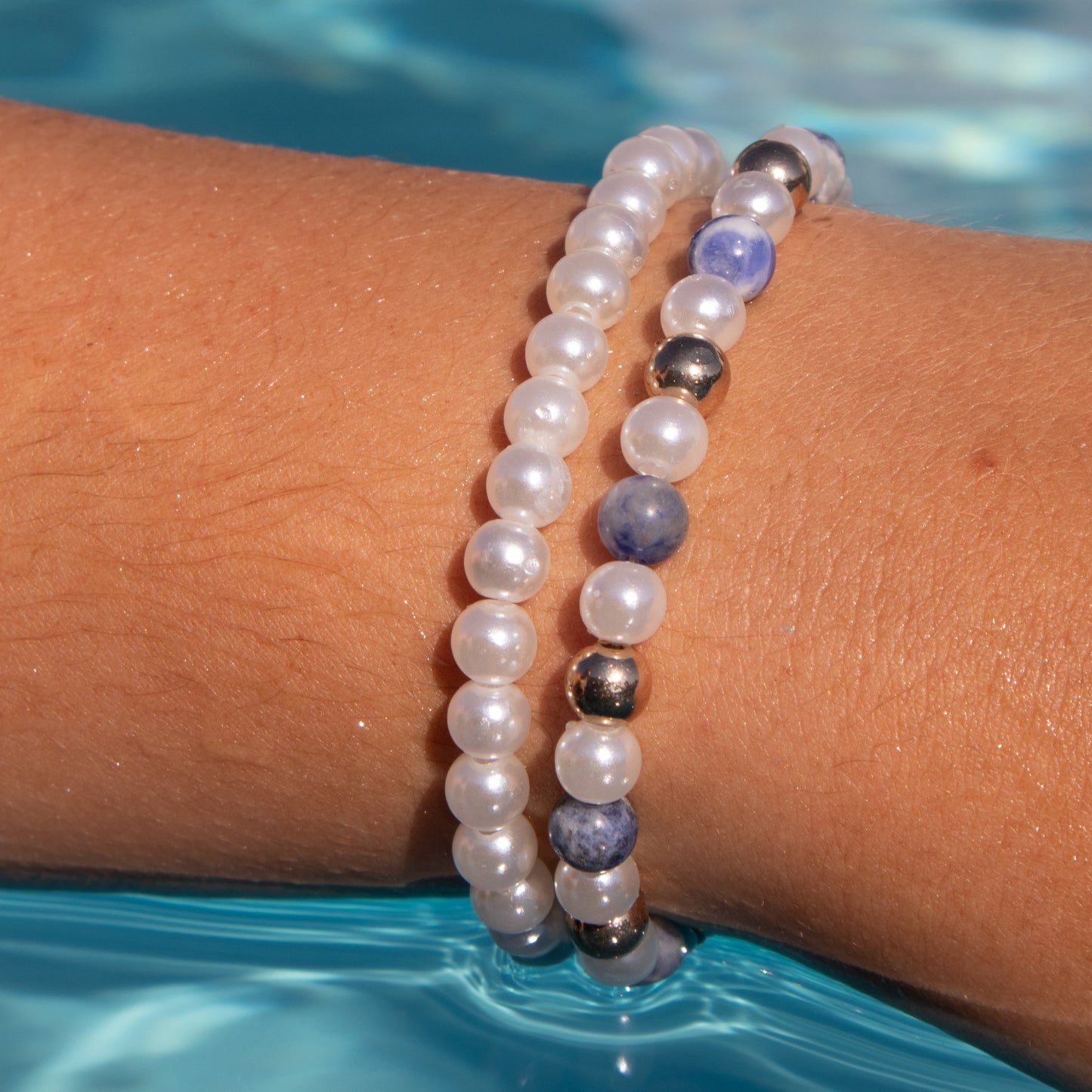 Paired Pearl, Blue Marble, and Gold Bracelets